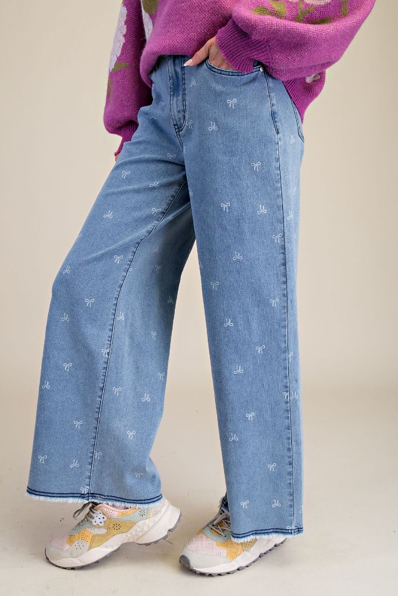 BOW PRINTED STRETCH DENIM PANTS