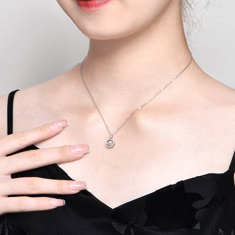 Dancing Moissanite Charm Necklace in 925 Sterling Silver: 0.5 ct